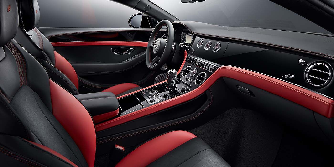 Bentley Braga Bentley Continental GT S coupe front interior in Beluga black and Hotspur red hide with high gloss Carbon Fibre veneer