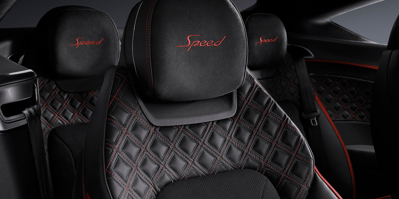 Bentley Braga Bentley Continental GT Speed coupe seat close up in Beluga black and Hotspur red hide