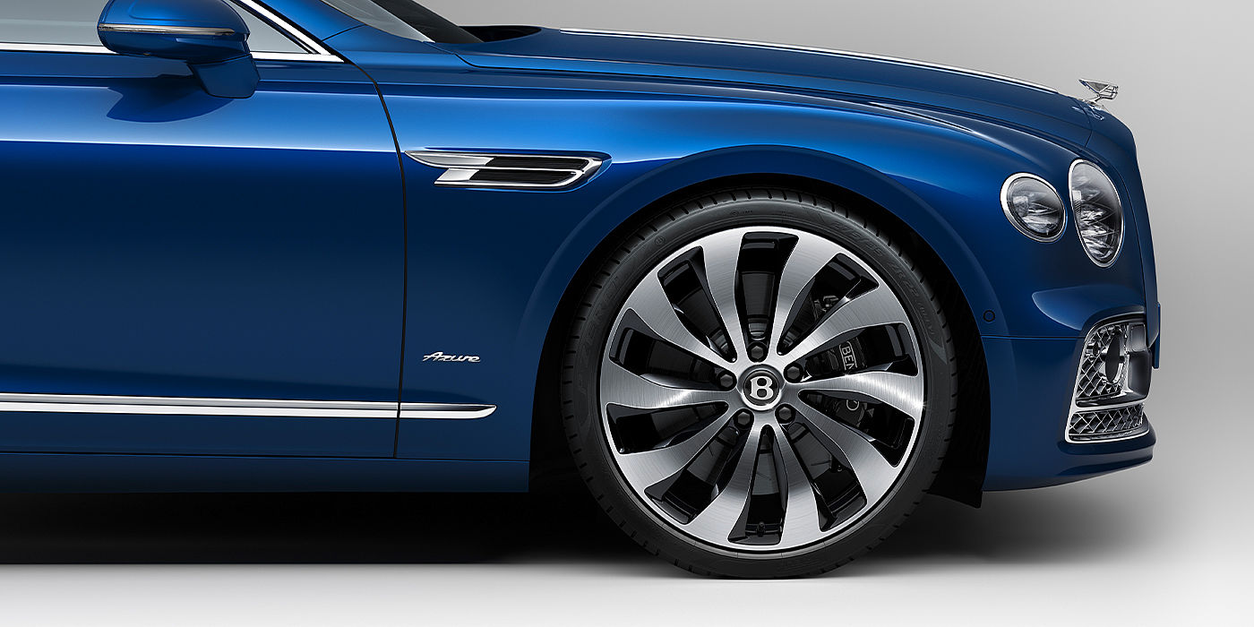 Bentley Braga Bentley Flying Spur Azure sedan side close up in Sequin Blue paint with Azure badge