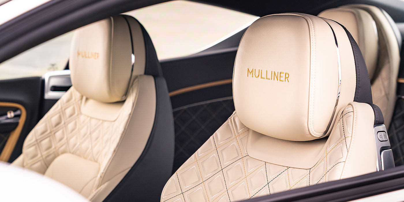 Bentley Braga Bentley Continental GT Mulliner coupe seat detail in Beluga black and Linen hide